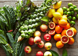 a group of fruits and vegetables on a wood surface Healthy Weight Loss Diets Airdrie